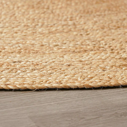 Natural Round Jute Rug – Hand Braided Fiber Design (Boho Minimal Style)
